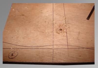 Drilling the baseboard fixing holes