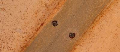 Baseboard holes drilled